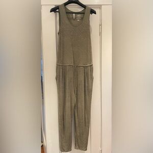 Stretchy green Uniqlo jumpsuit, MoMA special edition